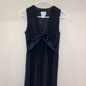 Donna Morgan simple black dress. Bow can be adjusted in the front. Like new.